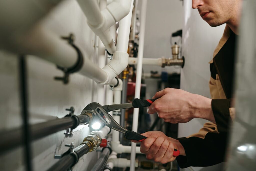 Plumbers maintaining commercial plumbing pipes in Altamonte Springs