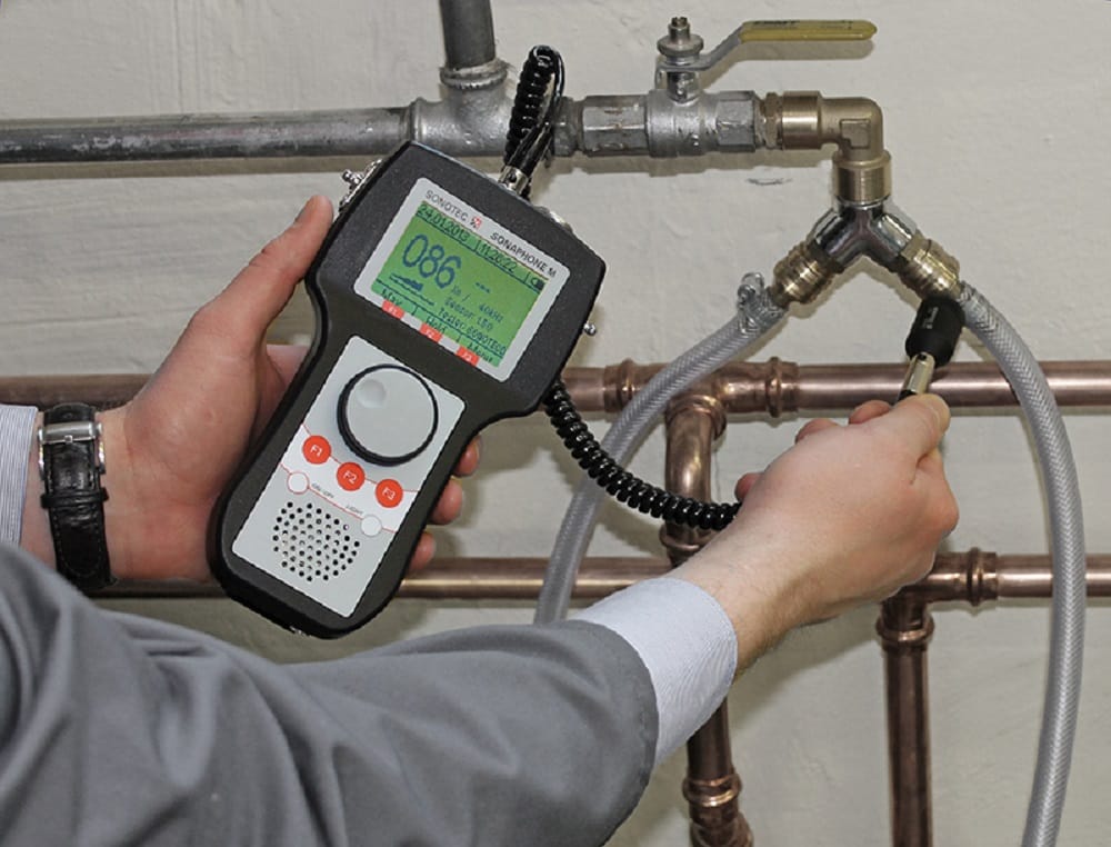 Plumber testing pipes with electronic leak detection equipment in Altamonte Springs